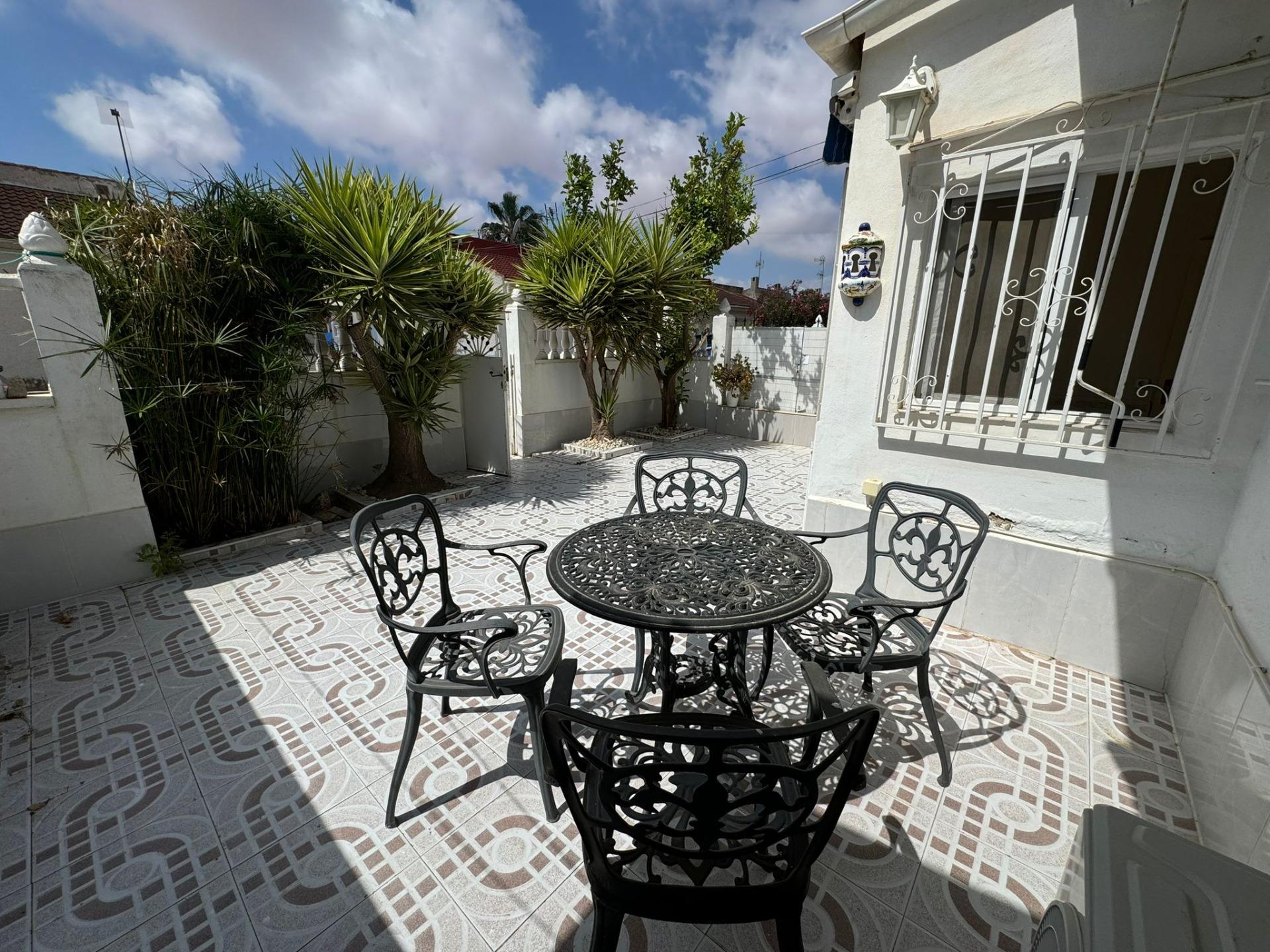 Explore this charming semi-detached house in the heart of Torrevieja, featuring 2 cozy bedrooms, a spacious living room, and a modern kitchen. Enjoy your own private garden oasis and a versatile glazed terrace perfect for entertaining. With nearby beaches just a short drive away and essential amenities close by, this property is ideal for a permanent home or investment opportunity. Don’t miss your chance to experience the vibrant lifestyle of Torrevieja – contact